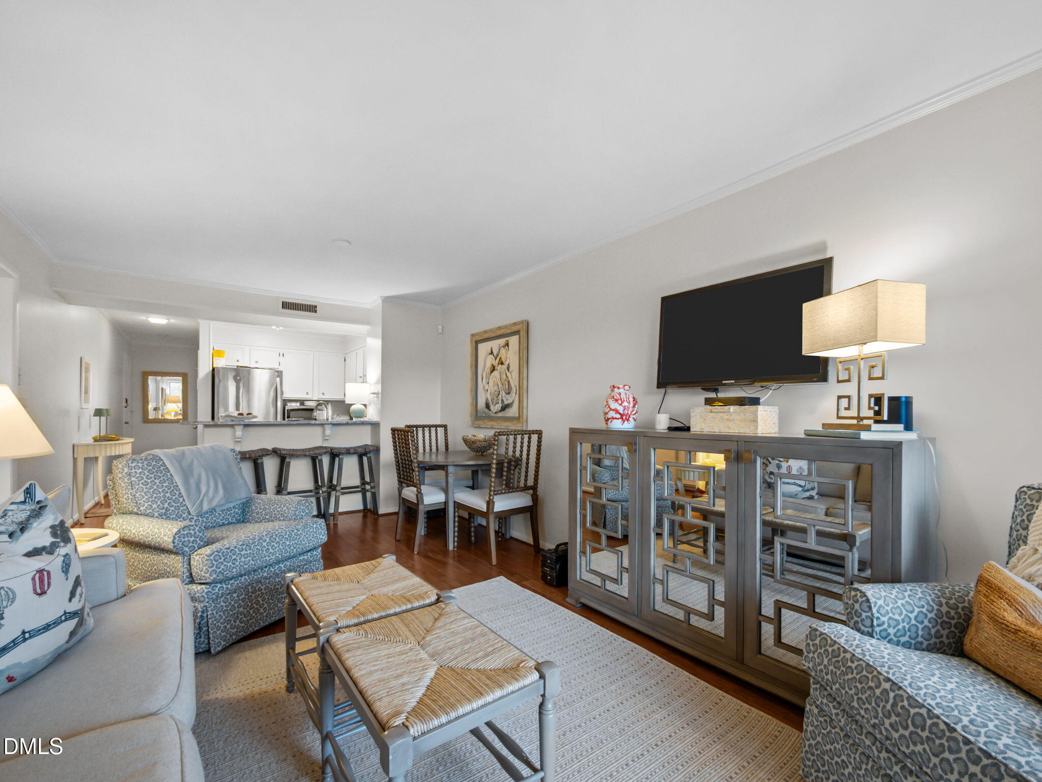 2308 West Fort Macon Road, Unit 204H Atlantic Beach, NC 28512 - Photo 6 of 83 a living room with furniture and a flat screen tv