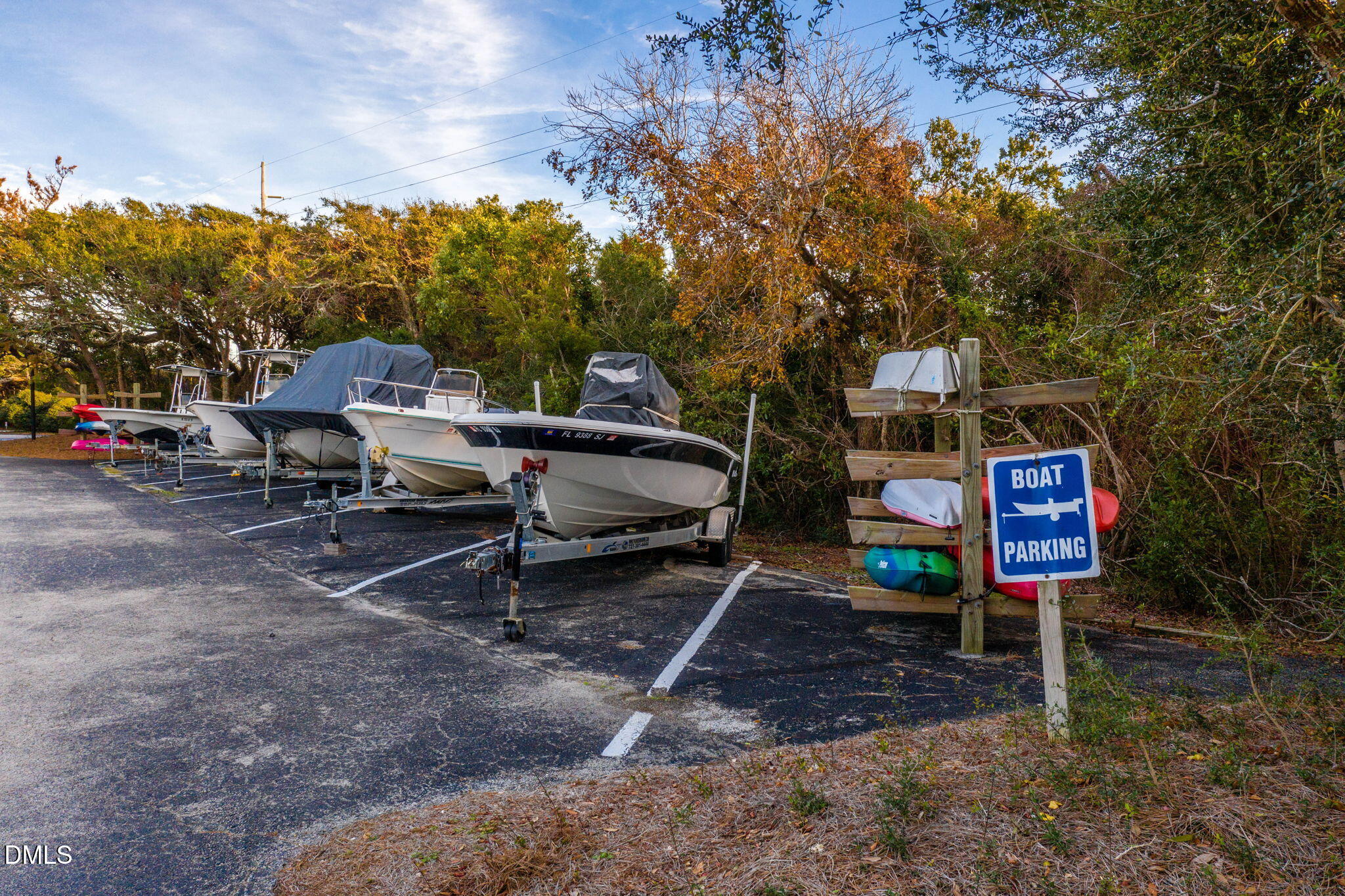 2308 West Fort Macon Road, Unit 204H Atlantic Beach, NC 28512 - Photo 71 of 83 a sign that is sitting on a rock