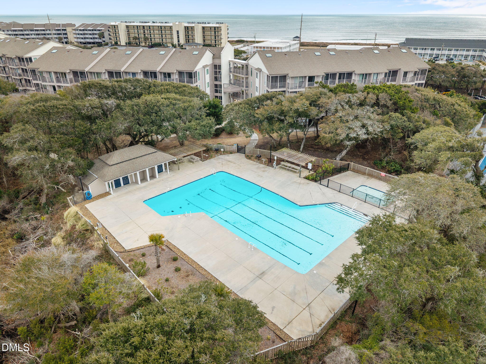 2308 West Fort Macon Road, Unit 204H Atlantic Beach, NC 28512 - Photo 74 of 83 a view of a swimming pool with a terrace