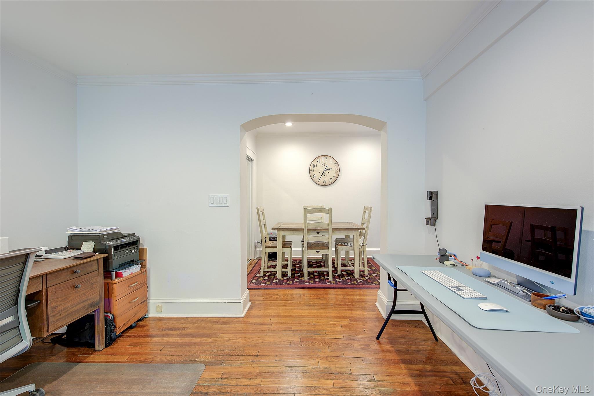 2 Town House Place, Unit 2H Great Neck, NY 11021 - Photo 14 of 43 a living room with furniture and a flat screen tv