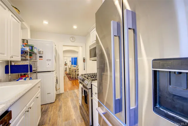 a storage room with washer and dryer