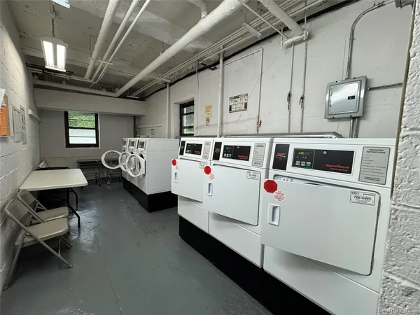 a utility room with cabinets