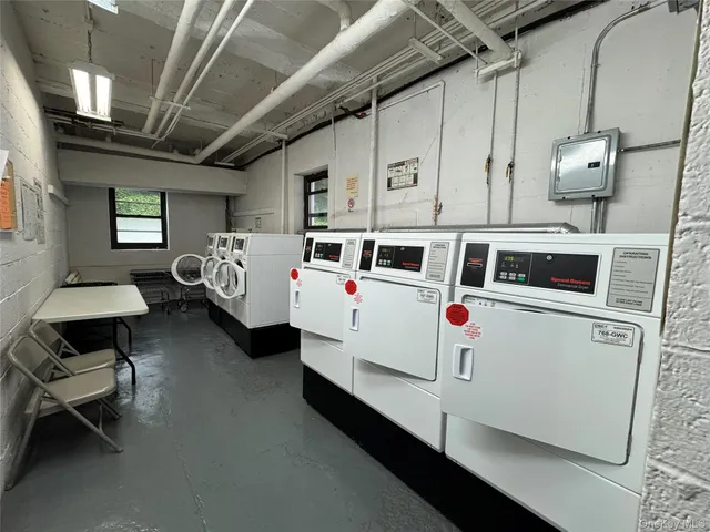 a utility room with cabinets