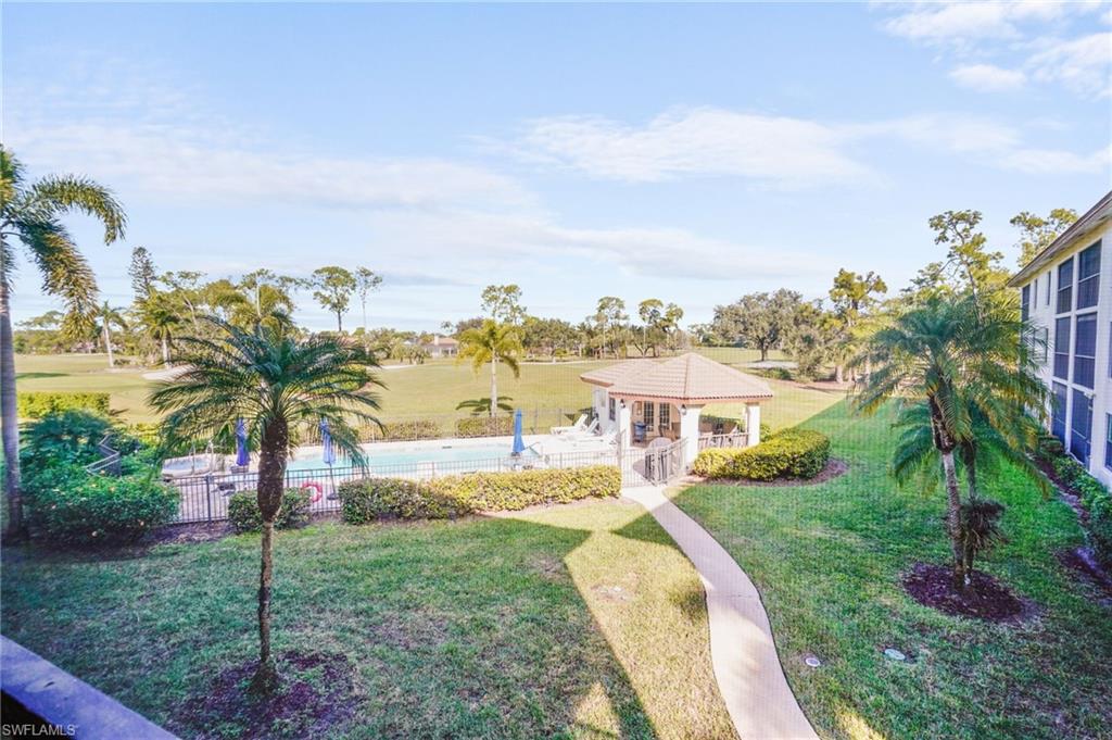 601 Augusta Boulevard, Unit 10 Naples, FL 34113 - Photo 19 of 27 View of yard with a gazebo and a patio area