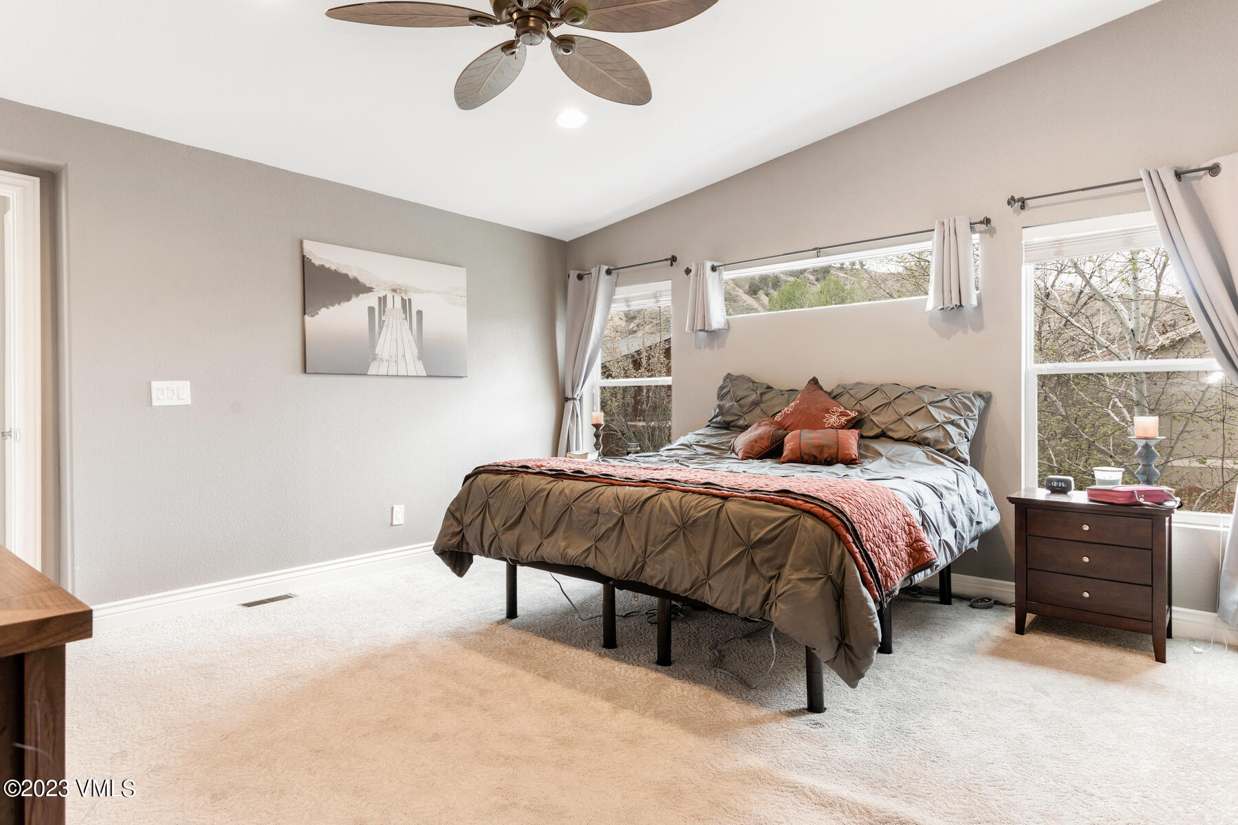 376 Blacksmith Road Eagle, CO 81631 - Photo 13 of 32 a bedroom with a bed and window