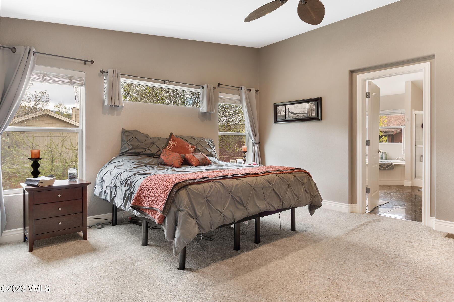 376 Blacksmith Road Eagle, CO 81631 - Photo 14 of 32 a bedroom with a bed and a dresser