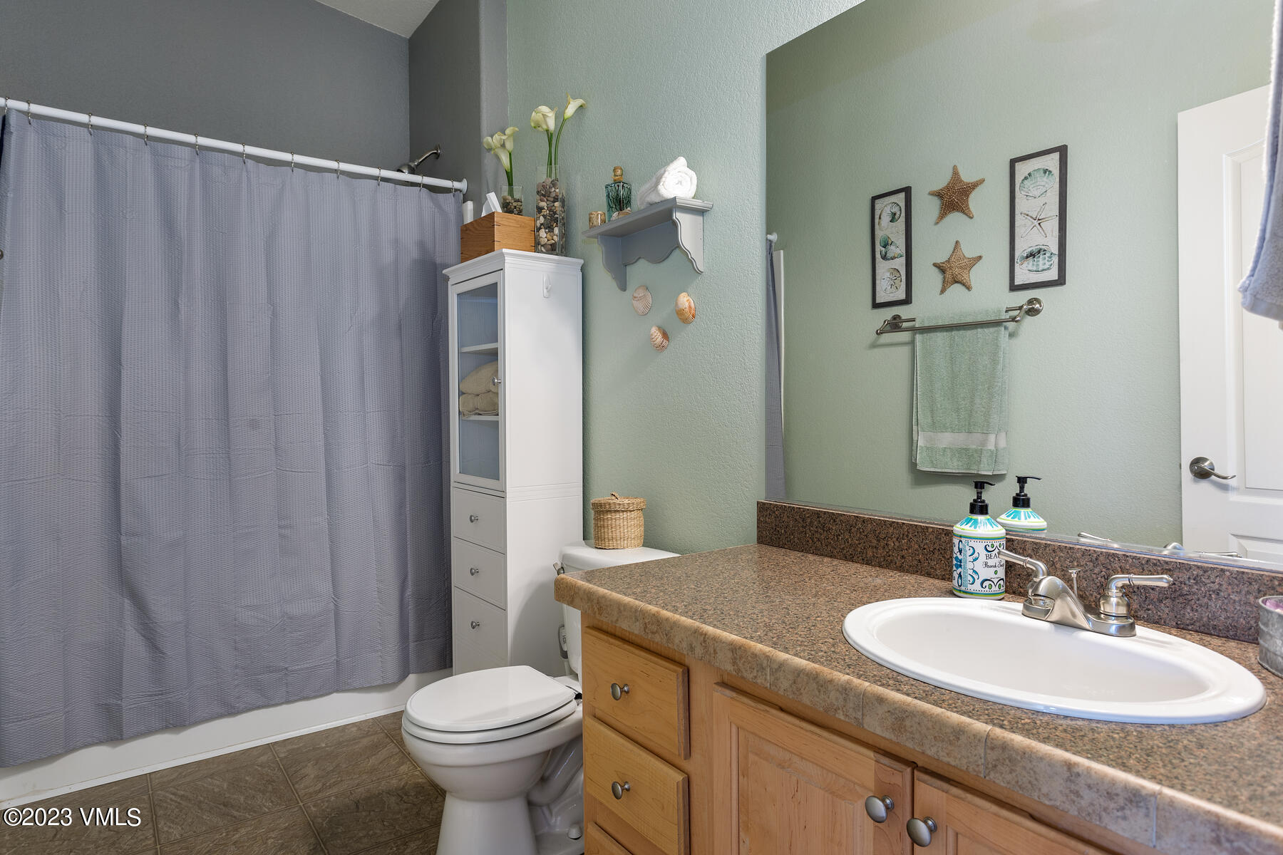 376 Blacksmith Road Eagle, CO 81631 - Photo 18 of 32 a bathroom with a granite countertop sink toilet and mirror
