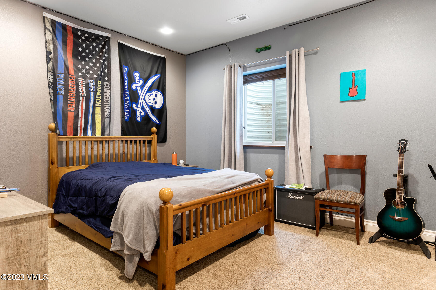 376 Blacksmith Road Eagle, CO 81631 - Photo 20 of 32 a bedroom with a bed and a window