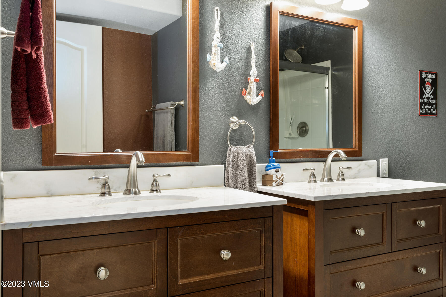 376 Blacksmith Road Eagle, CO 81631 - Photo 22 of 32 a bathroom with a double vanity sink and a mirror