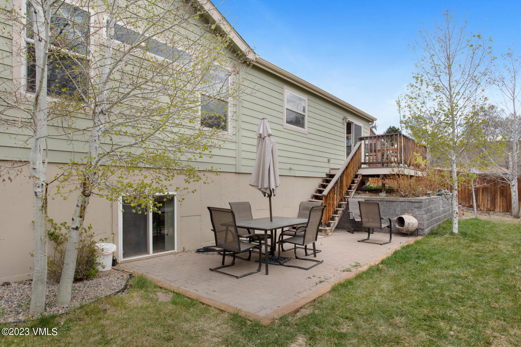 376 Blacksmith Road Eagle, CO 81631 - Photo 29 of 32 a view of a house with patio and a yard