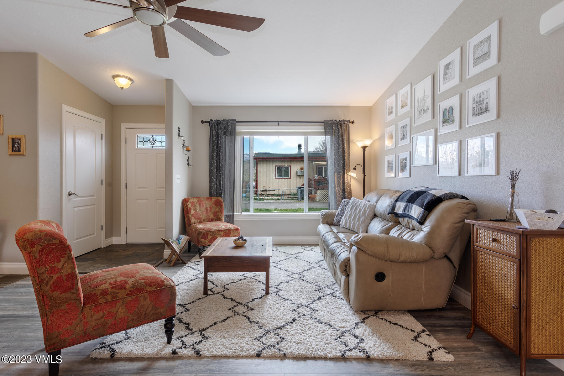 376 Blacksmith Road Eagle, CO 81631 - Photo 5 of 32 a living room with furniture and a large window