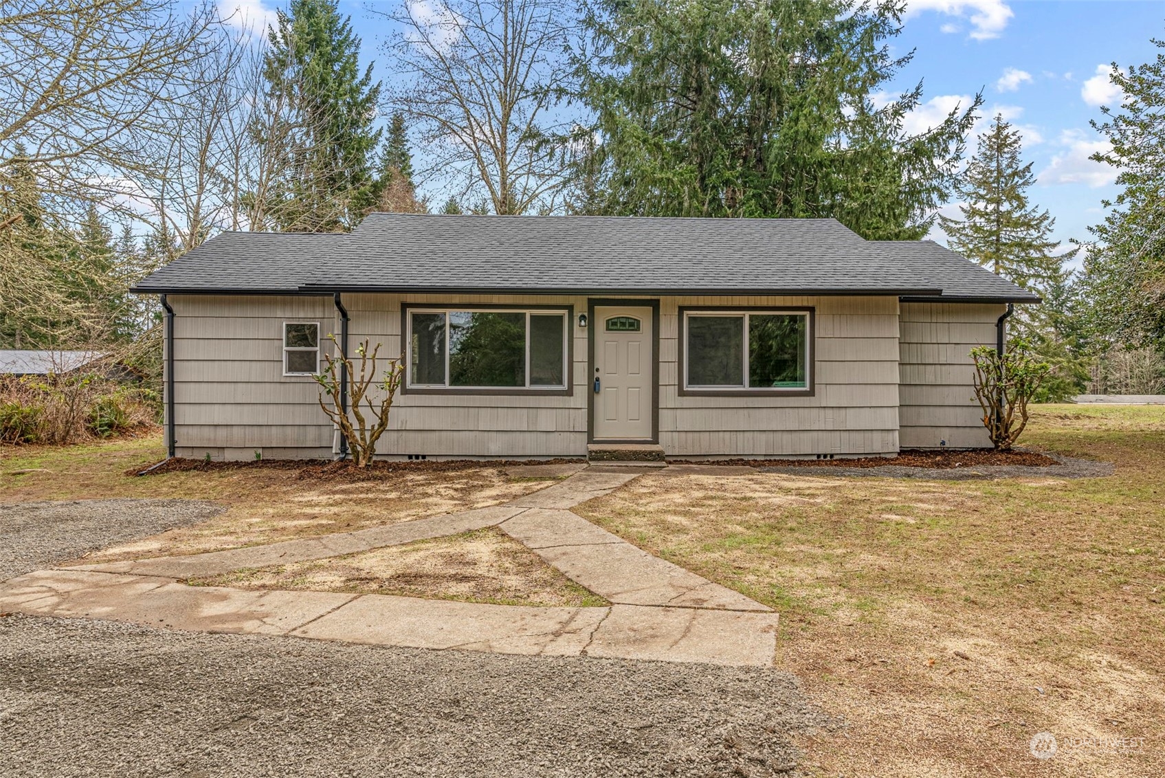 1541 Sightly Road Toutle, WA 98649 - Photo 2 of 30 a front view of a house with a yard and garage