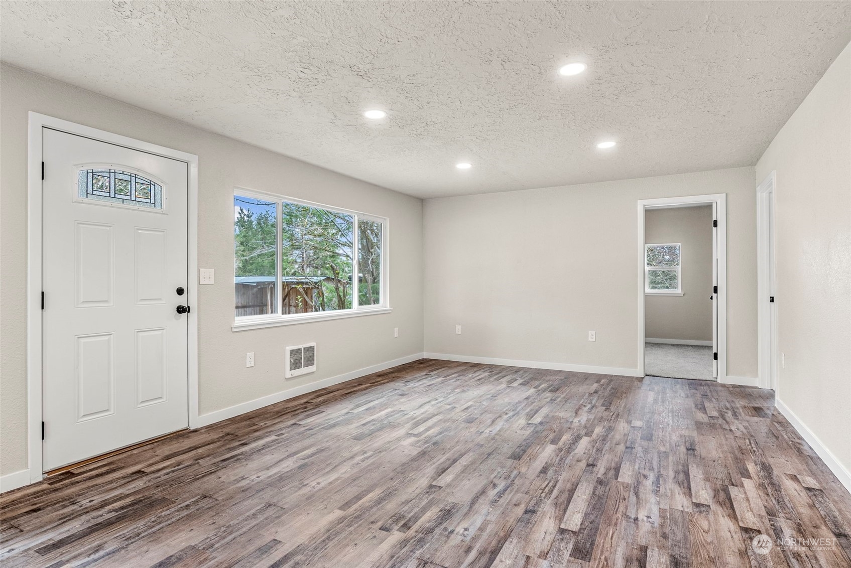 1541 Sightly Road Toutle, WA 98649 - Photo 10 of 30 wooden floor in an empty room with a window