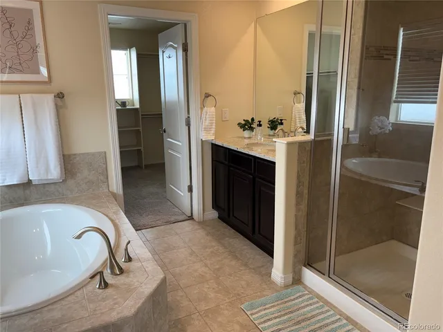 a bathroom with a shower and a toilet
