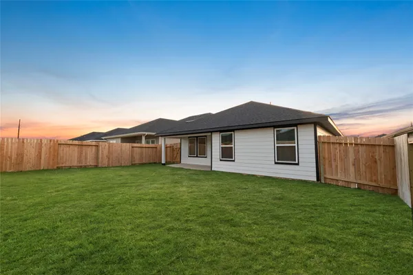 a front view of house with yard