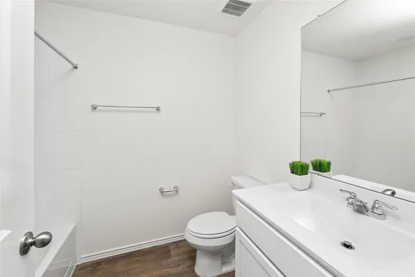 a view of a room that has a window in it