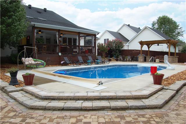 970 South Ridge Trail Clarksville, TN 37043 - Photo 2 of 20 In the Back of the House is the In-Ground Heated Salt Water Pool with Electric Cover. There is Plenty of Room for Outdoor Entertaining!