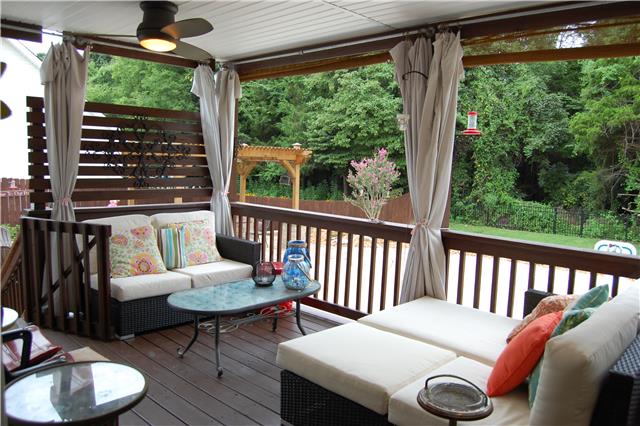 970 South Ridge Trail Clarksville, TN 37043 - Photo 12 of 20 The Gigantic Covered Deck has Three Ceiling Fans, and is Perfect for Outdoor Dining or Entertaining!