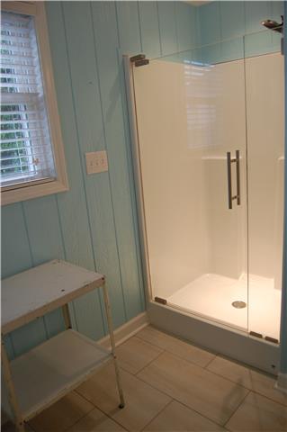 970 South Ridge Trail Clarksville, TN 37043 - Photo 18 of 20 The Pool House Bathroom also Features a Large Shower and Tile Floor.