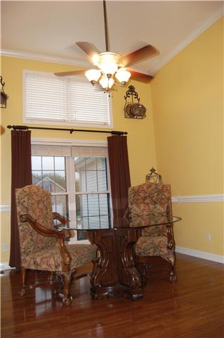 970 South Ridge Trail Clarksville, TN 37043 - Photo 4 of 20 The Formal Dining Room Has Beautiful Crown Molding and Chair Rail, as well as a Double Window for lots of Natural Light.