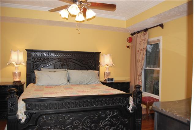 970 South Ridge Trail Clarksville, TN 37043 - Photo 7 of 20 The Beautiful Master Suite Features a Tray Ceiling with Crown Molding, His & Hers Walk-In Closets, and an Absolutely Stunning Master Bathroom!