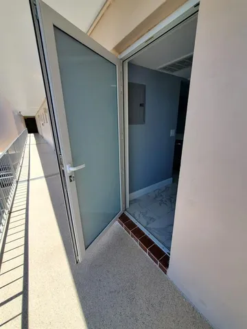 a kitchen with a sink stainless steel appliances and cabinets