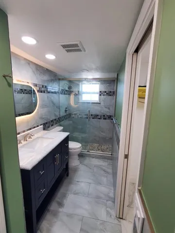 a view of buildings with yard