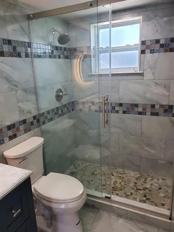a close view of a shower in a bathroom