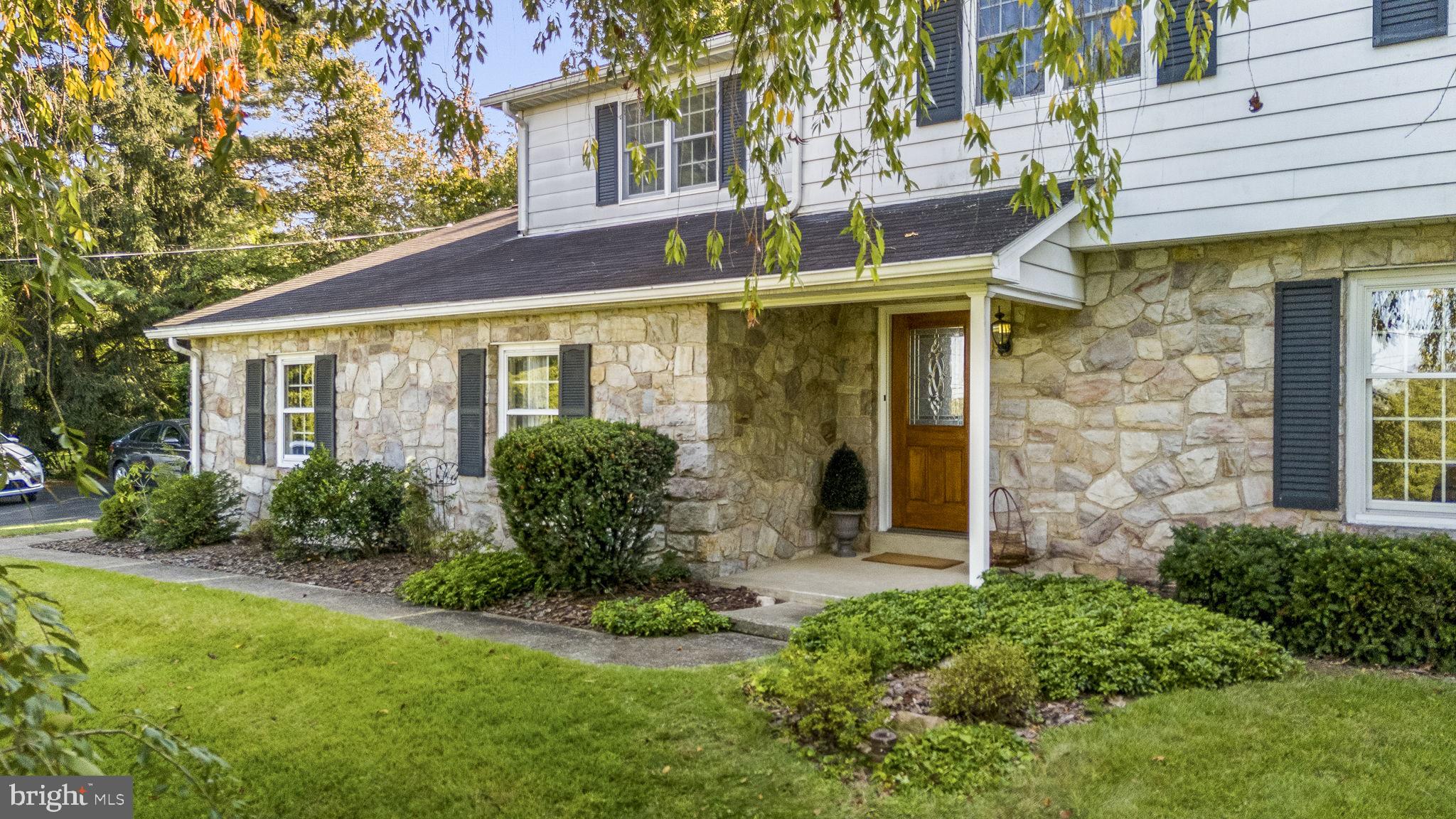 1311 Temple Road Pottstown, PA 19465 - Photo 40 of 49 a front view of a house with garden