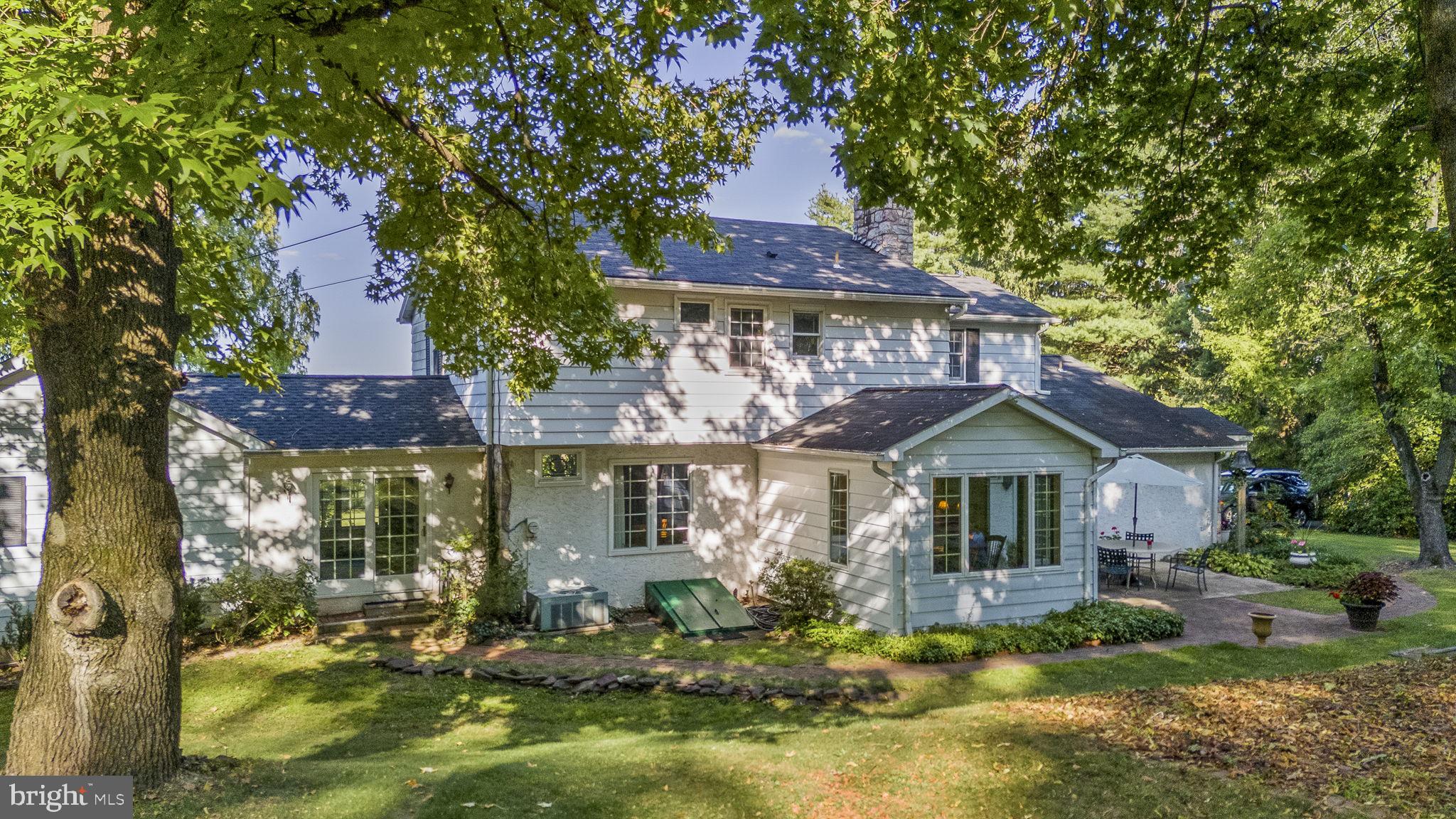 1311 Temple Road Pottstown, PA 19465 - Photo 4 of 49 a front view of a house with a yard