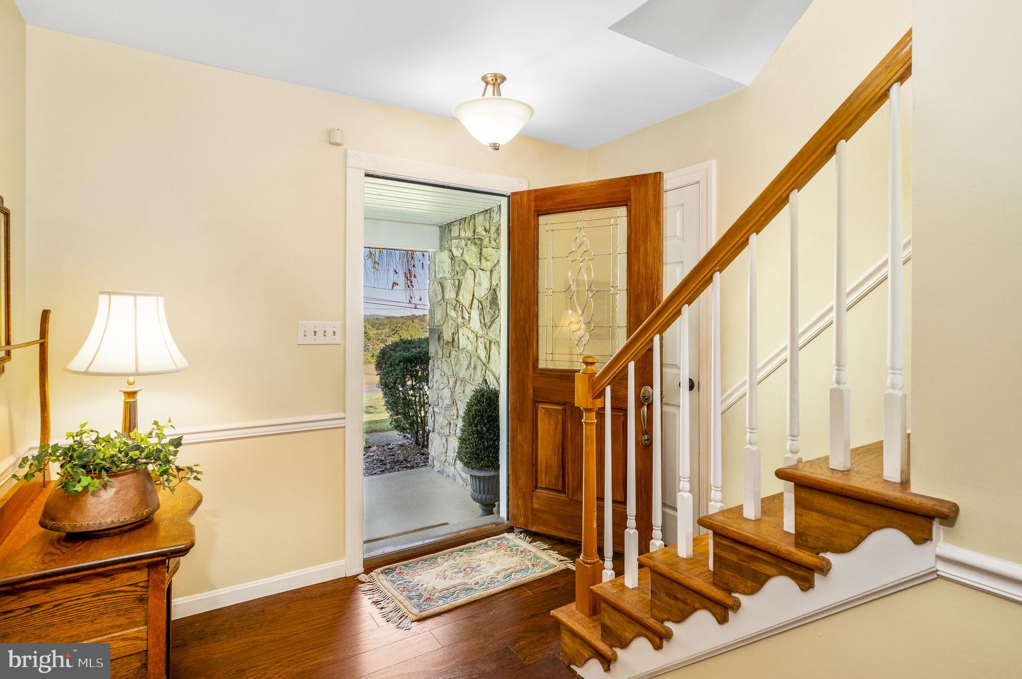 1311 Temple Road Pottstown, PA 19465 - Photo 9 of 49 a view of an entryway with wooden floor and livingroom view