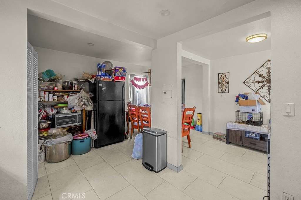 116 North Holly Avenue Compton, CA 90221 - Photo 13 of 23 a room with storage and utility room