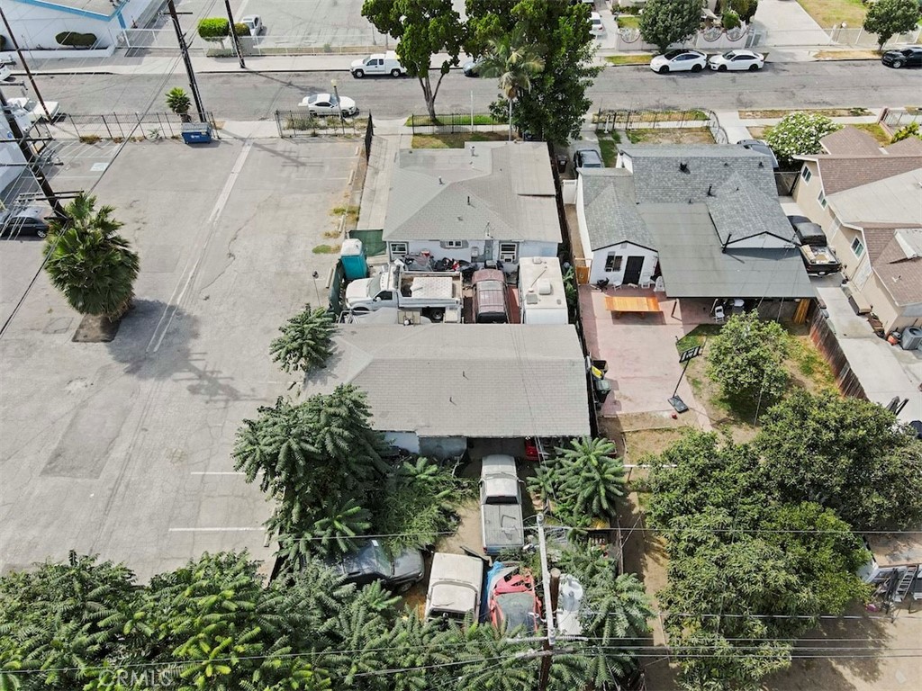 116 North Holly Avenue Compton, CA 90221 - Photo 3 of 23 an aerial view of a house with yard and seating space