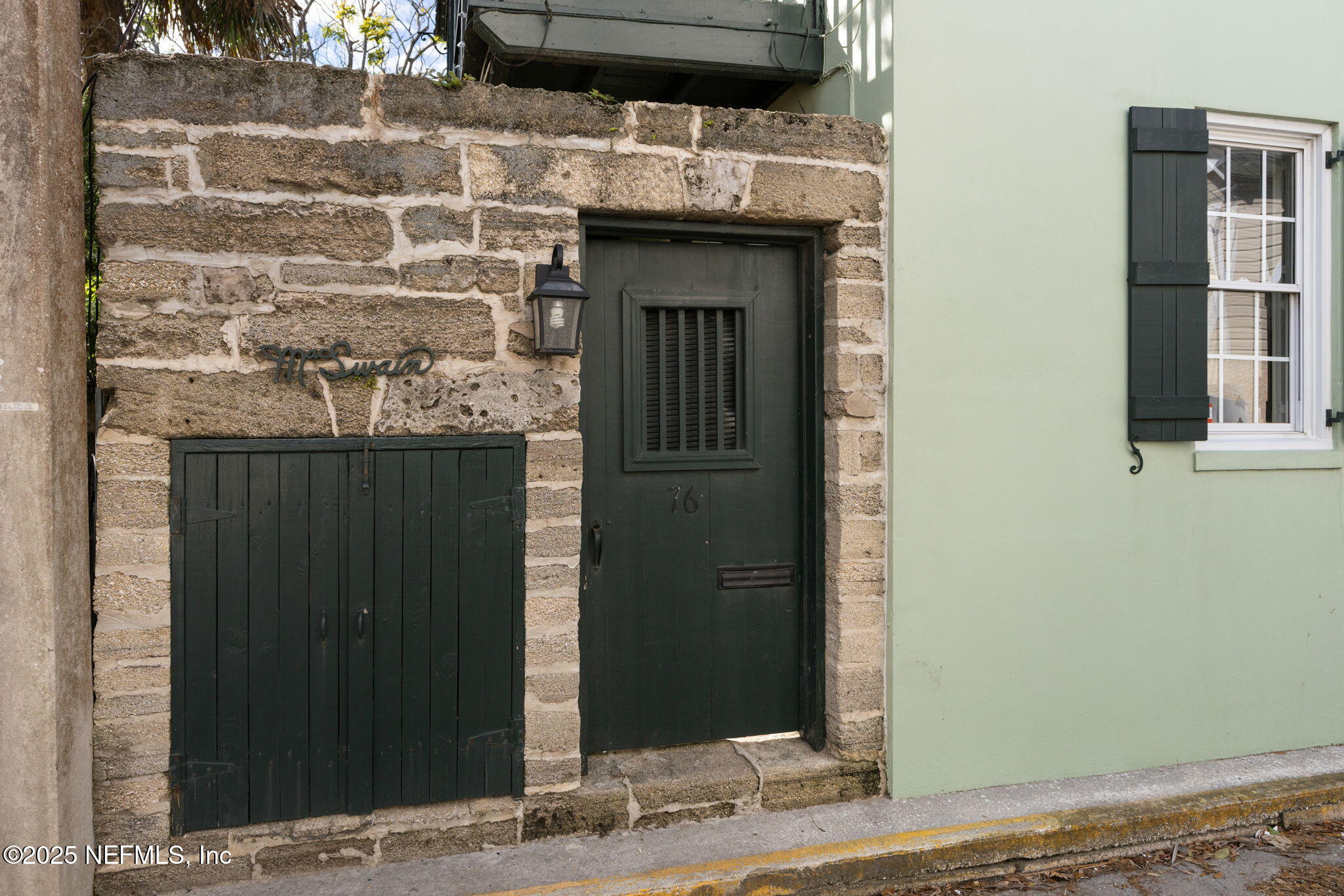 76 Marine Street St. Augustine, FL 32084 - Photo 12 of 60 a view of a entryway door front of house