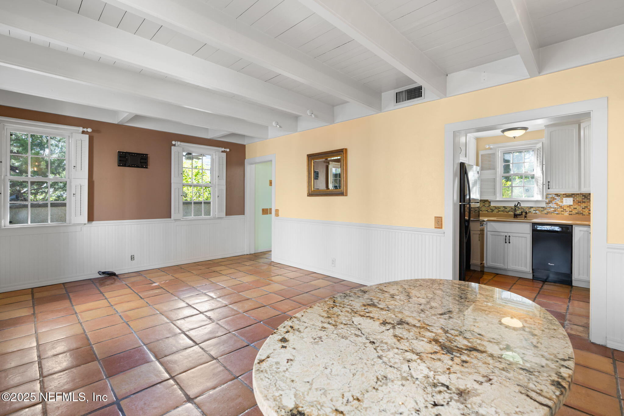 76 Marine Street St. Augustine, FL 32084 - Photo 16 of 60 a view of a bedroom with window and bathroom