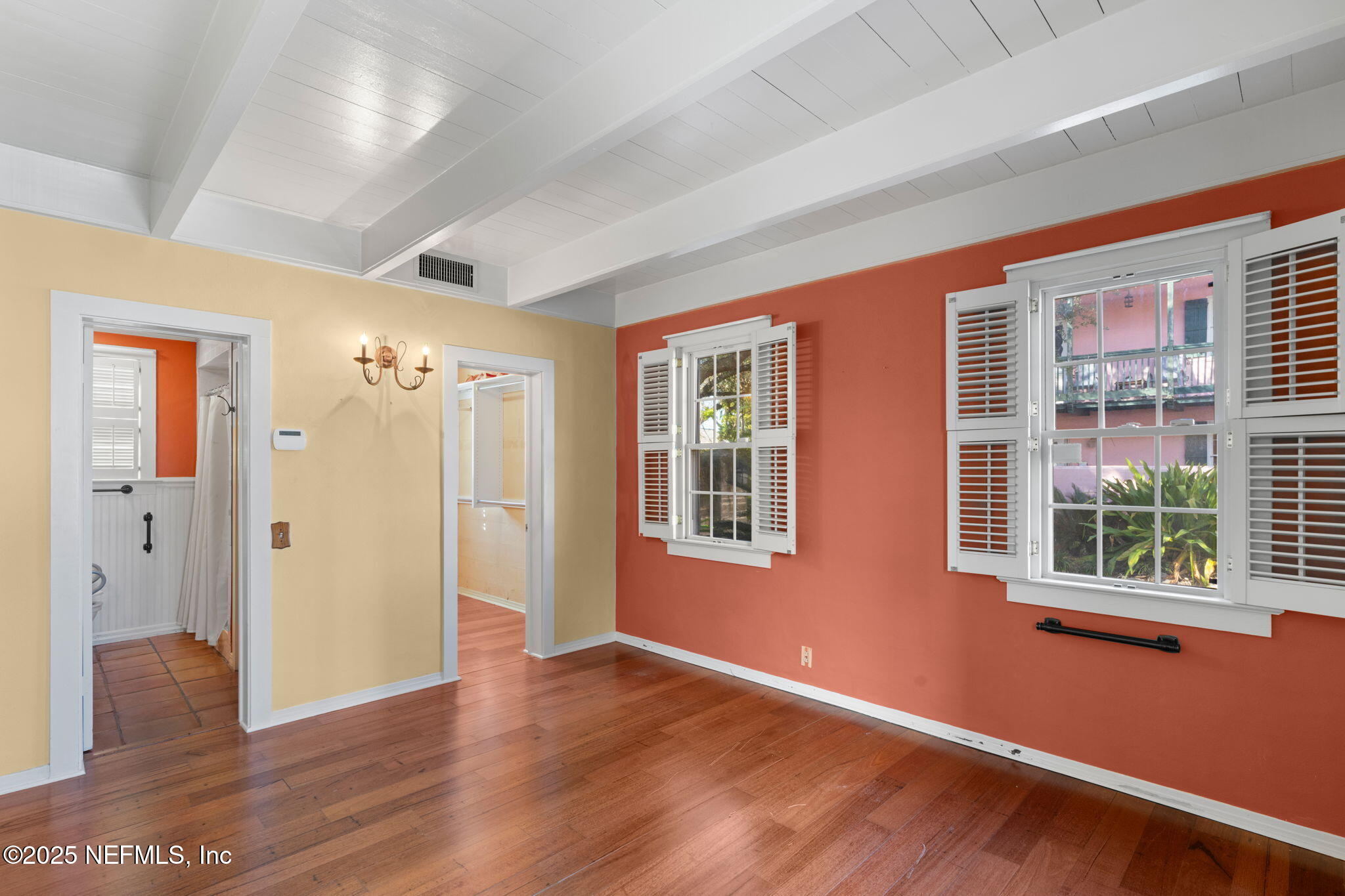 76 Marine Street St. Augustine, FL 32084 - Photo 20 of 60 a view of livingroom with front door and wooden floor