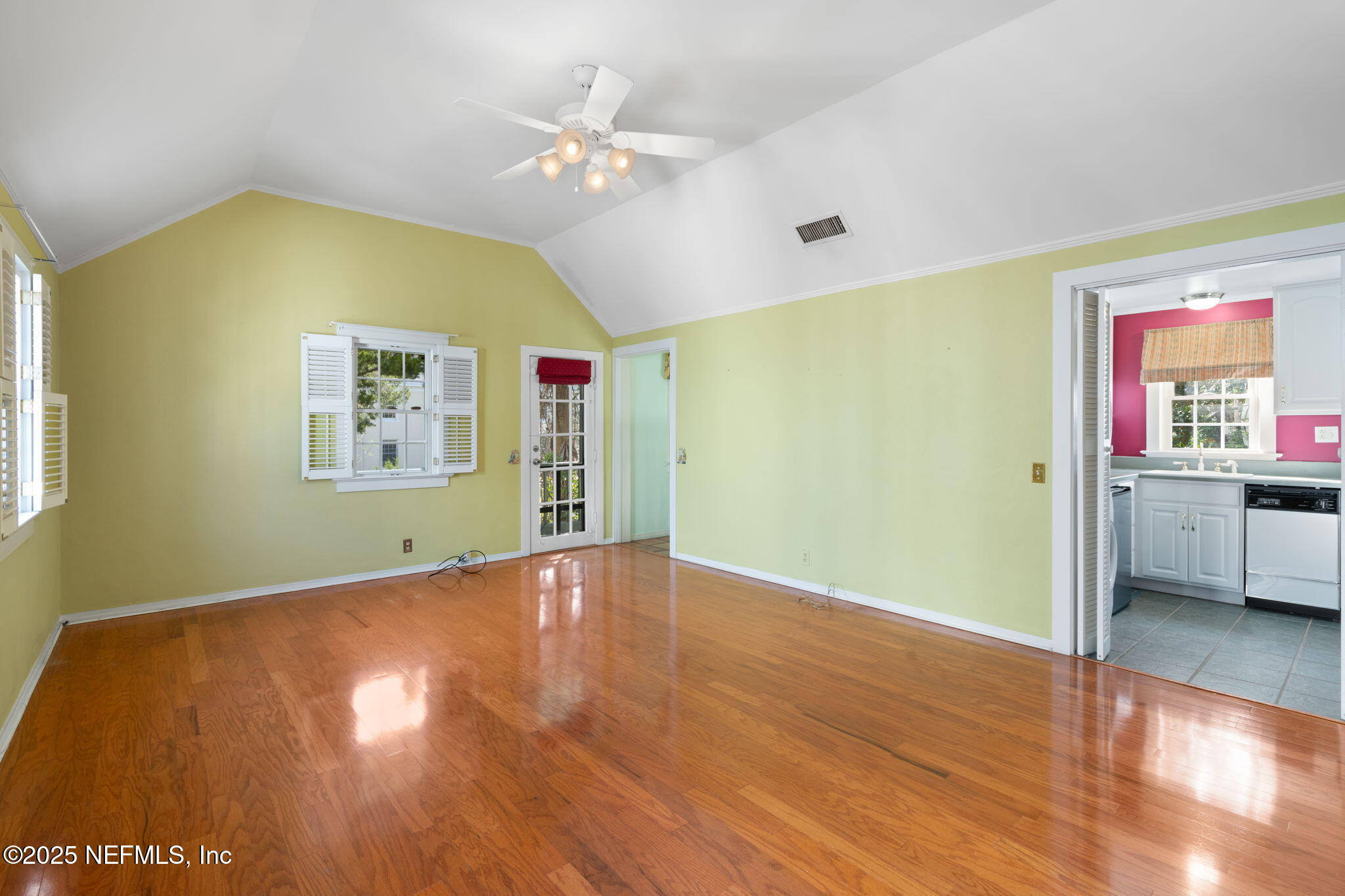 76 Marine Street St. Augustine, FL 32084 - Photo 26 of 60 a view of an empty room with window and wooden floor