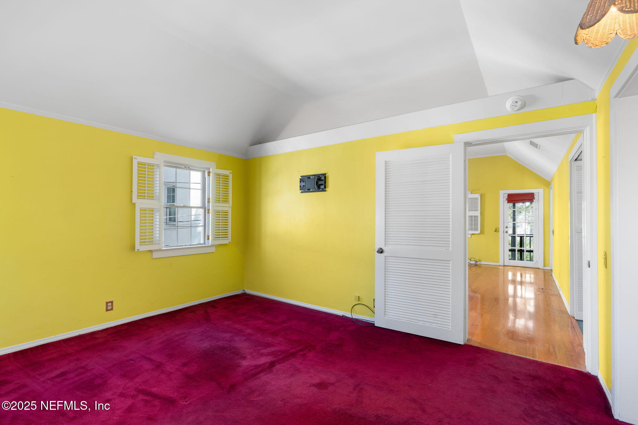 76 Marine Street St. Augustine, FL 32084 - Photo 31 of 60 a view of an empty room with a window