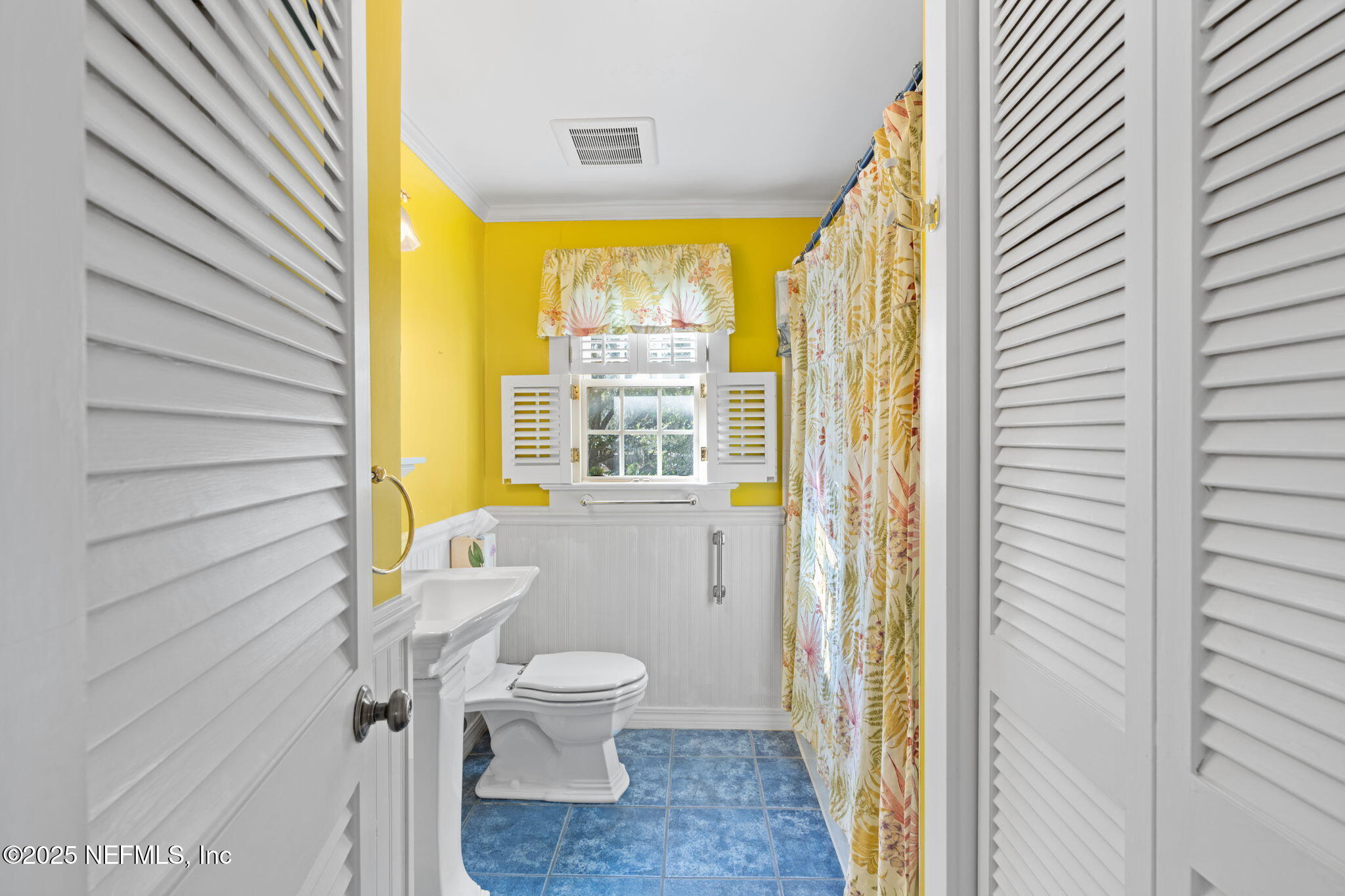 76 Marine Street St. Augustine, FL 32084 - Photo 32 of 60 a bathroom with a toilet and a shower