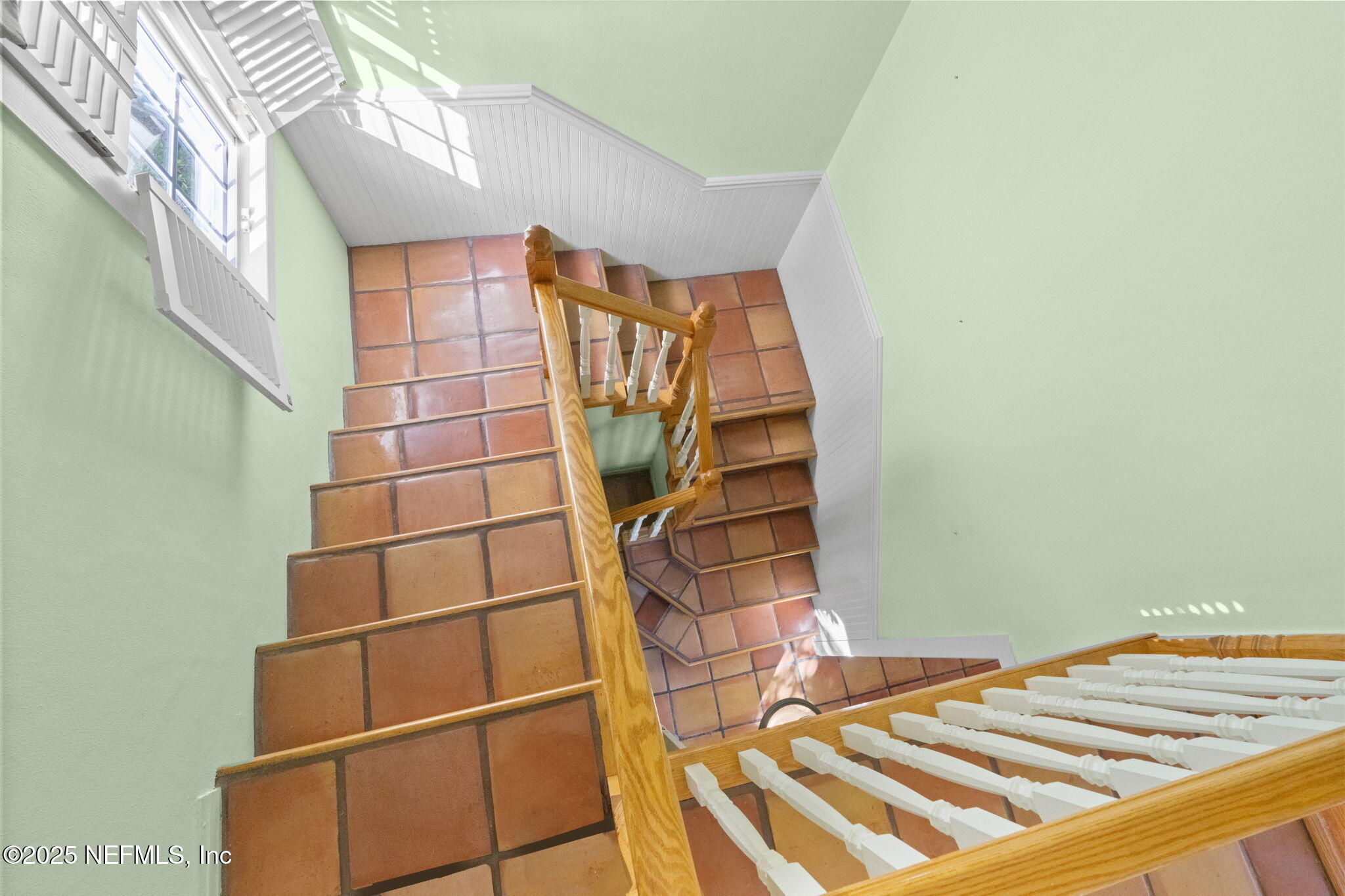 76 Marine Street St. Augustine, FL 32084 - Photo 36 of 60 a view of a room with racks on the wall