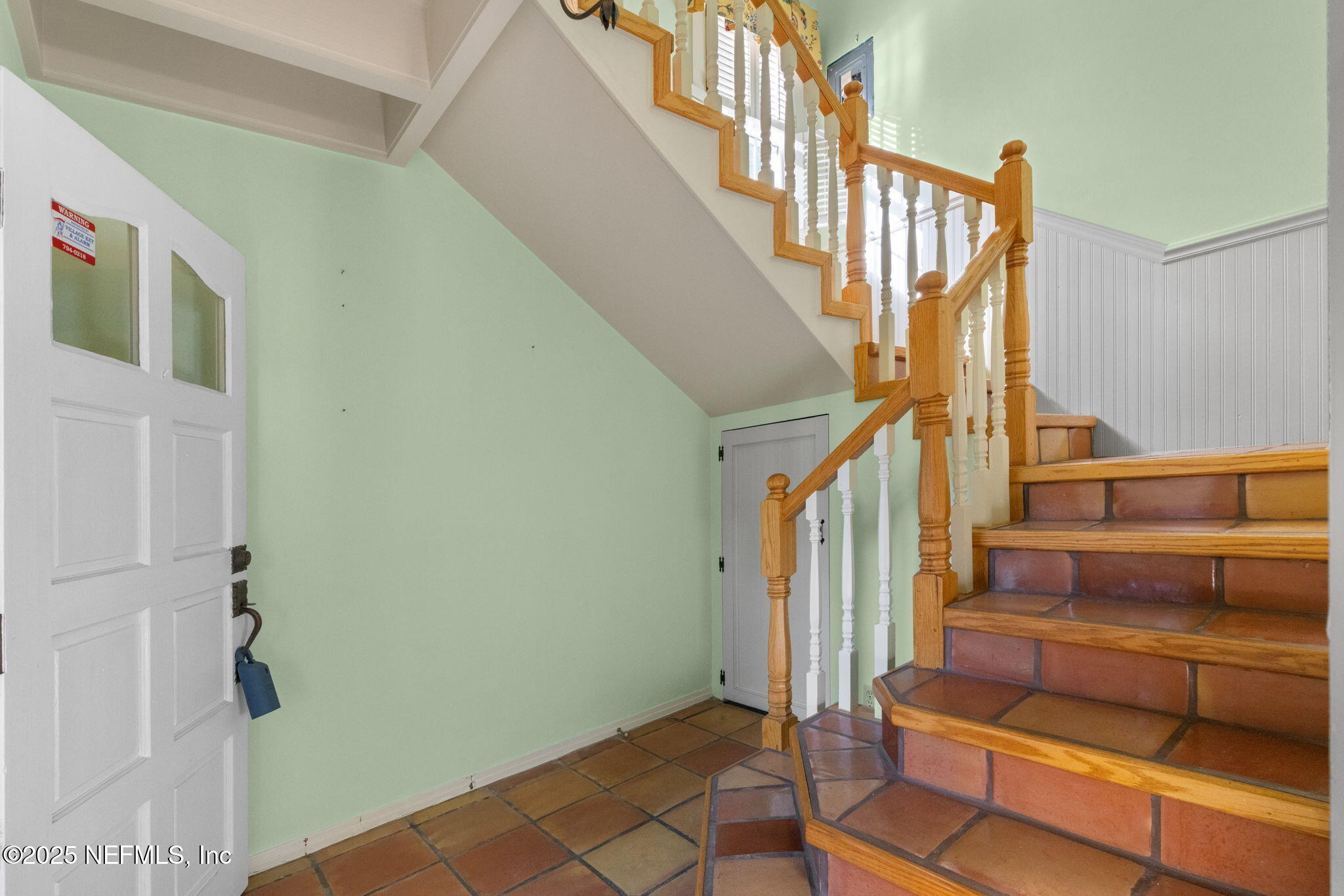 76 Marine Street St. Augustine, FL 32084 - Photo 39 of 60 a view of entryway and hall with wooden floor