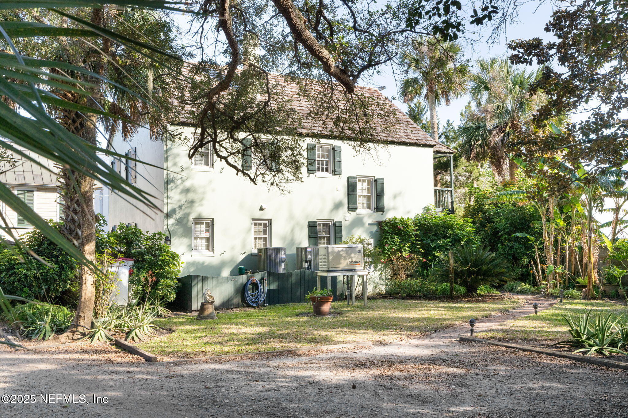 76 Marine Street St. Augustine, FL 32084 - Photo 46 of 60 a view of a yard in front of a house