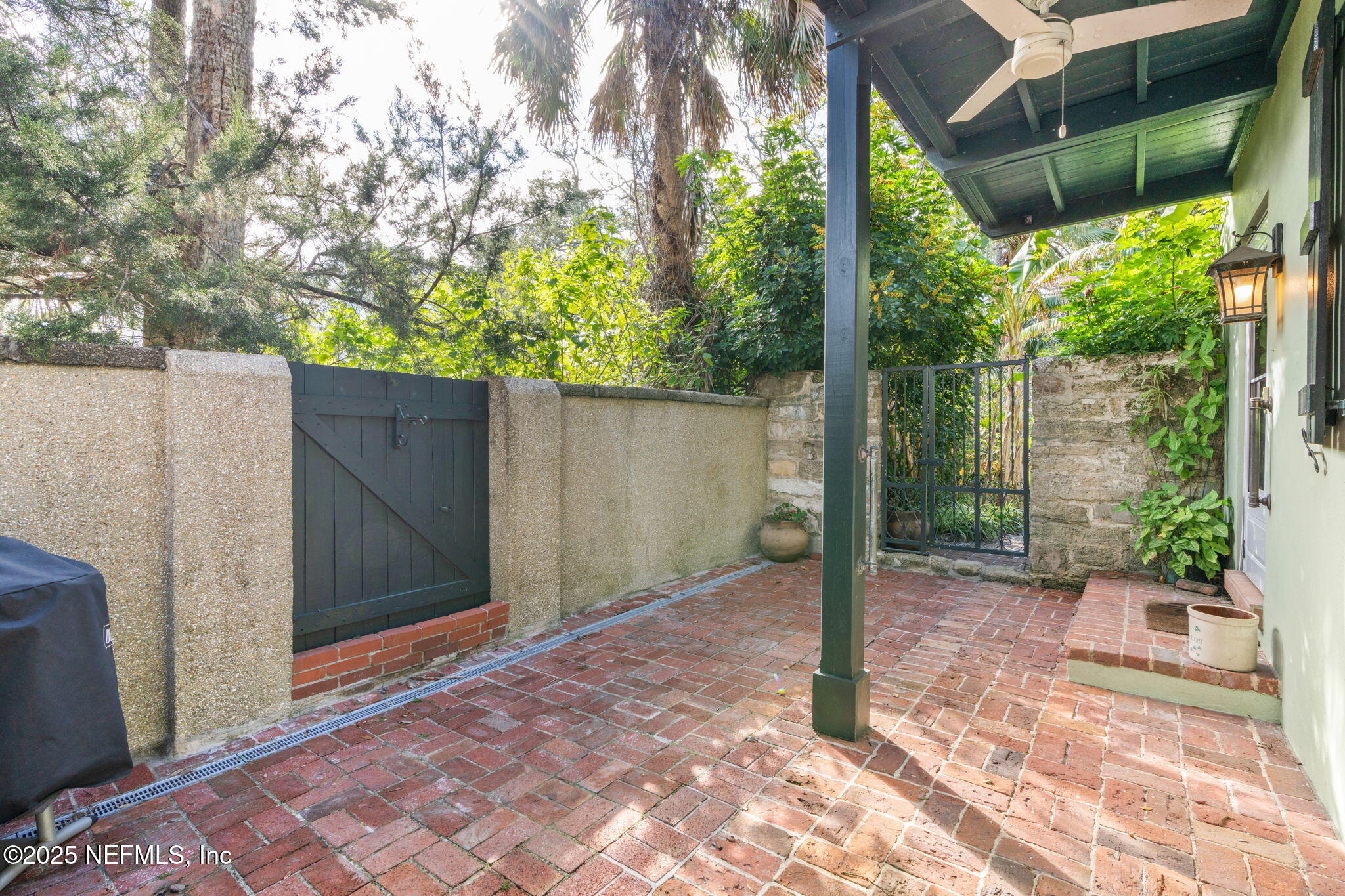 76 Marine Street St. Augustine, FL 32084 - Photo 10 of 60 a backyard of a house with lots of green space