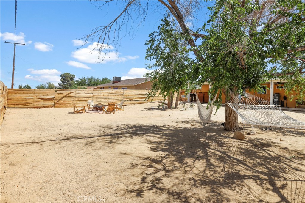 61516 Valley View Drive Joshua Tree, CA 92252 - Photo 23 of 38 a view of ocean with large tree