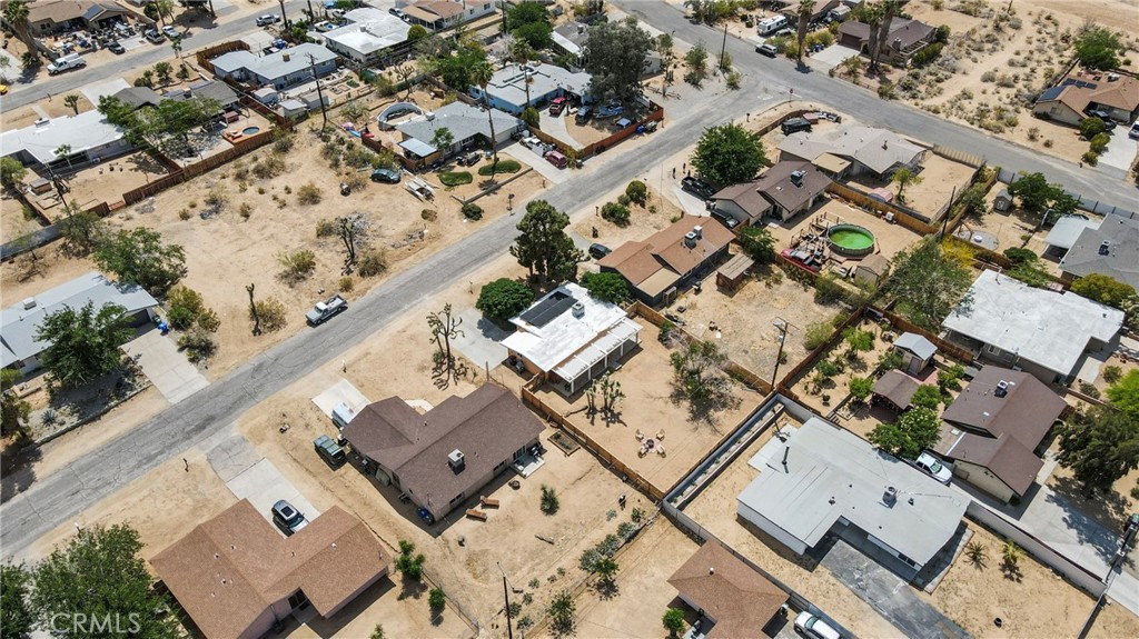 61516 Valley View Drive Joshua Tree, CA 92252 - Photo 27 of 38 an aerial view of a city with lots of residential buildings