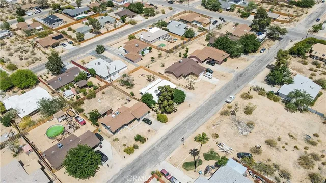 an aerial view of residential house with an outdoor space