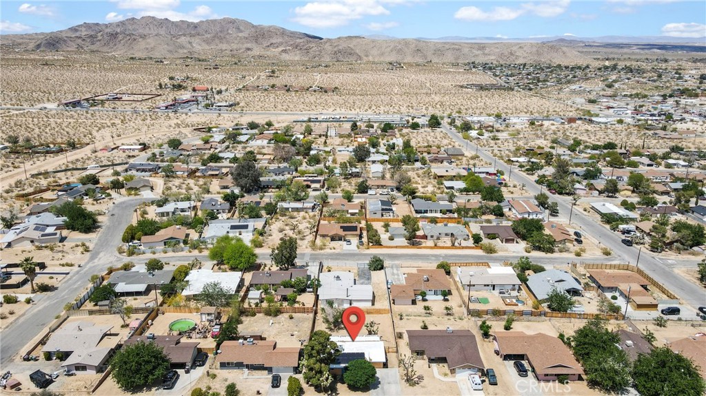 61516 Valley View Drive Joshua Tree, CA 92252 - Photo 36 of 38 an aerial view of residential building and parking space