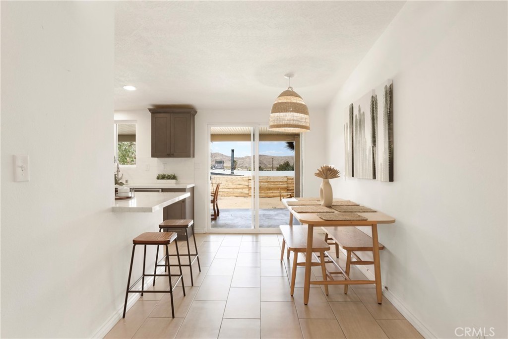 61516 Valley View Drive Joshua Tree, CA 92252 - Photo 7 of 38 a view of a dining room with furniture