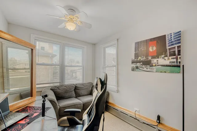 a workspace with furniture and a window