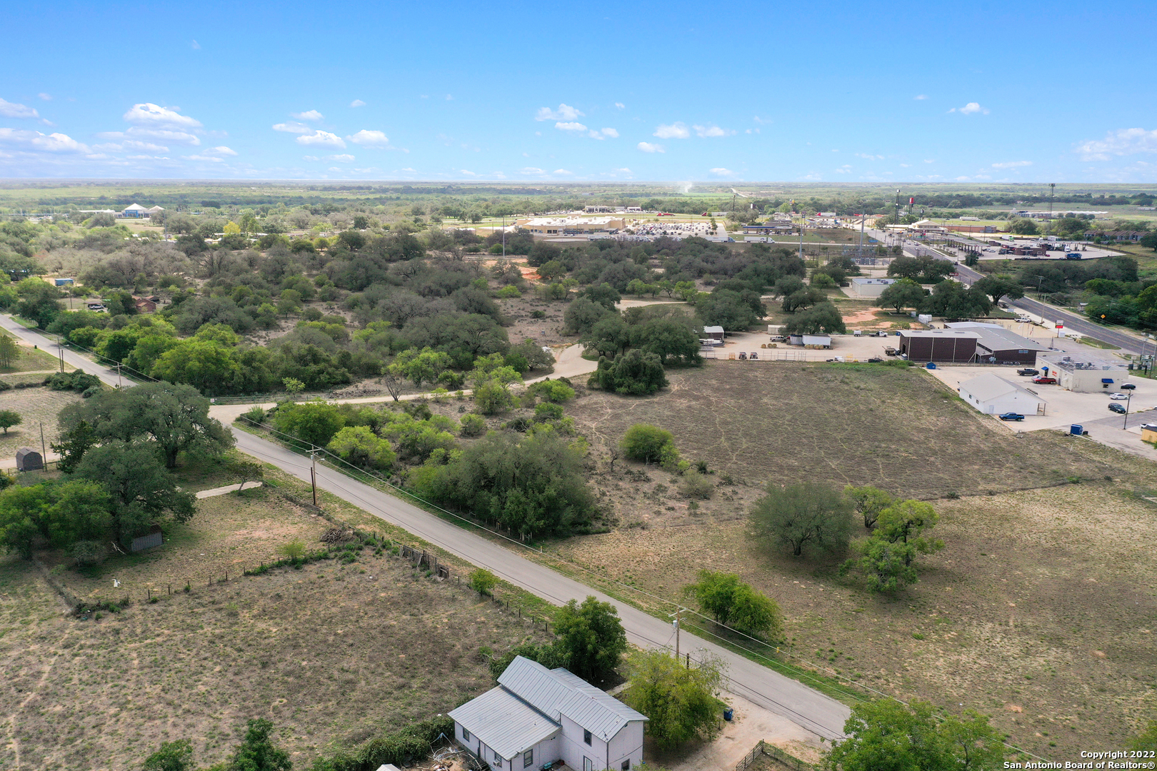 0 Rossville Road Devine, TX 78016 - Photo 2 of 12 an aerial view of a city